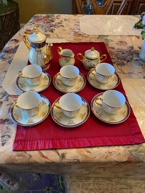 Imperial Porcelain White, Gold and Red Gilded Tea & Coffee Service x 17 pieces.
